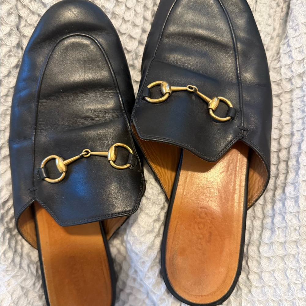Gucci Black and Gold Leather Mules with Horsebit Detail